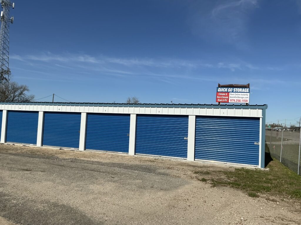Quick Go Storage facility entrance in Angleton Texas with clear signage.
